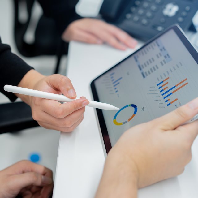 Close up team of marketing hand try to explaining about company’